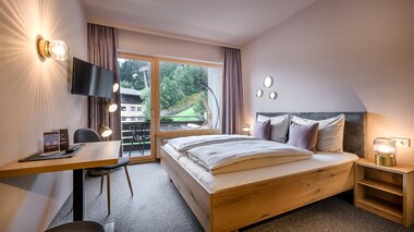 Berglift Blick auf den Schlafbereich im Zimmer | © Berglift